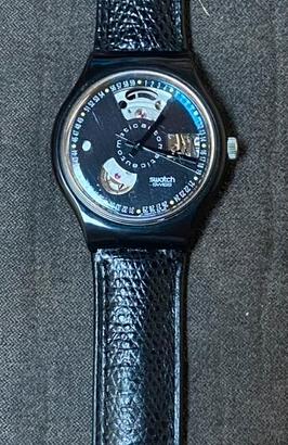 Swatch AUTOMATIC BLACK MOTION.