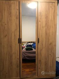Armadio tre ante