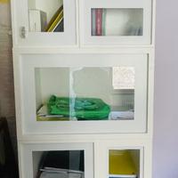 Libreria  con la porta in vero