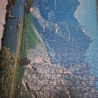 puzzle incorniciato montagne e lago pescatore