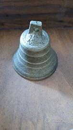 campana di bronzo dorato 