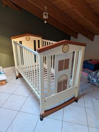 Lettino con sponde per bambini  e materasso 