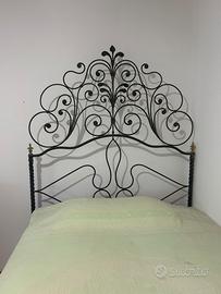 Letto antico in ferro battuto