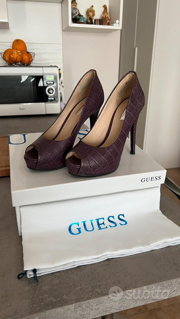 Scarpe hotsell dorate guess