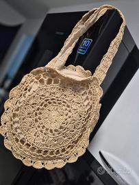 Borsa tonda con manici