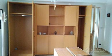 Parete soggiorno con letto a scomparsa 
