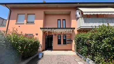 BILOCALE CON GIARDINO E GARAGE