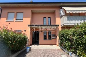 BILOCALE CON GIARDINO E GARAGE