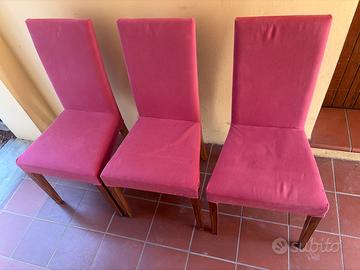 Tre sedie imbottite e rivestite in tessuto