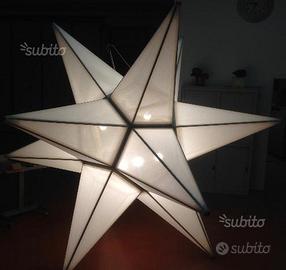 Stella Ducale in legno illuminata