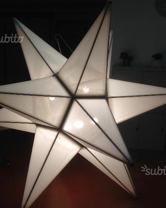 Stella Ducale in legno illuminata