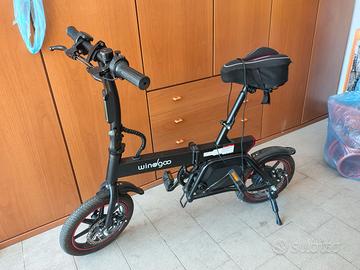 Bici elettrica pieghevole windgoo più copri sella