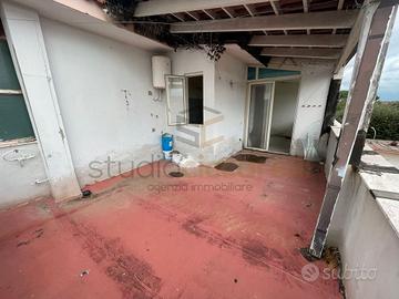 Mansarda Con Terrazzino a Livello In Condominio