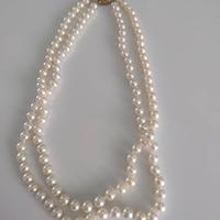 Collana da donna con perle e diamantino centrale