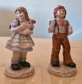 coppia di statuine di ceramica del '900