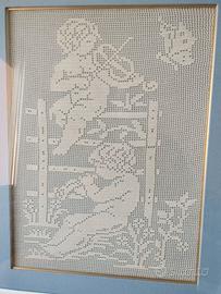 Quadro ricamato con cherubini