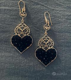 Orecchini pendenti con “charm” cuore