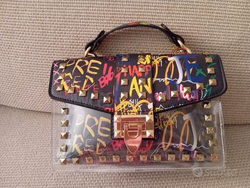 borsetta contenente pochette uguale.nuova 