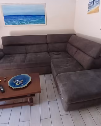 Divanoletto angolare con bauletto.