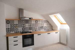 Mansarda ristrutturata e arredata con rendita atti