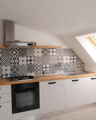 Mansarda ristrutturata e arredata con rendita atti