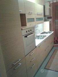 Cucina lineare in finitura rovere naturale