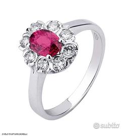 ANELLO ORO 18kt. CON DIAMANTI E RUBINO OVALE