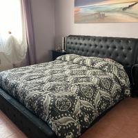 Letto conteritore in ecopelle nero