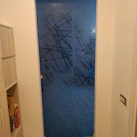 Porta scorrevole di vetro