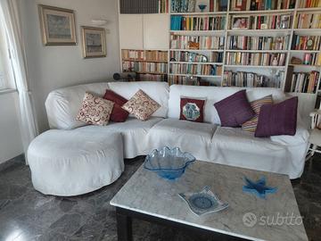 divano letto angolare bianco di pelle