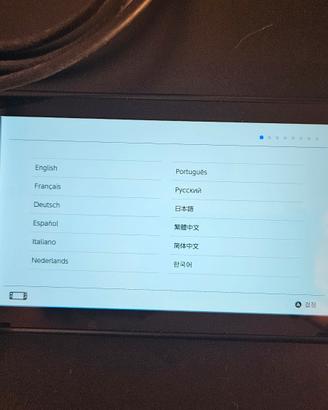 Nintendo Switch usata con accessori e un gioco