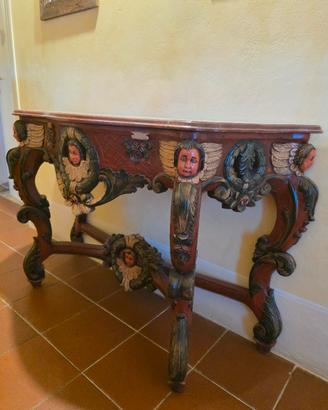console di legno intagliato, d'ispirazione barocca