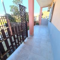 Appartamento piano terra con cortile e garage