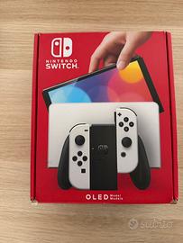 Nintendo Switch OLED + giochi e ring fit