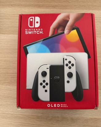 Nintendo Switch OLED + giochi e ring fit