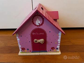 Case delle bambole in legno con mobili