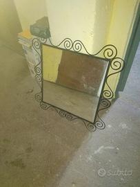 specchio in vetro e ferro battuto