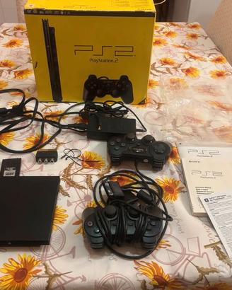 Ps2 slim nera con giochi