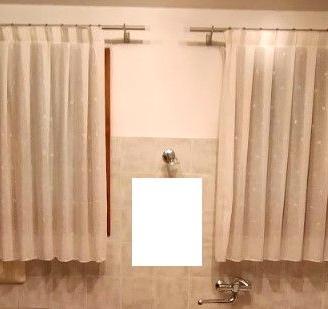 Tende ricamate a margherite