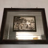 Quadro specchio con lastra d’argento in rilievo