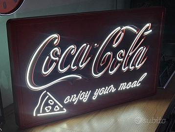 insegna luminosa Coca Cola 
