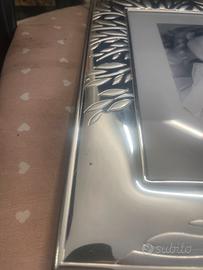 Cornice in argento