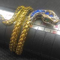 anello metallo placato oro, serpente. m. ita 14