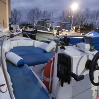 Barca open con motore Mariner 25cv