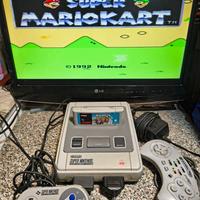 SUPERNINTENDO + 2 controllers + 7 cartucce giochi