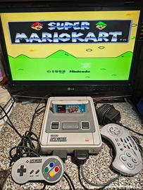 SUPERNINTENDO + 2 controllers + 7 cartucce giochi