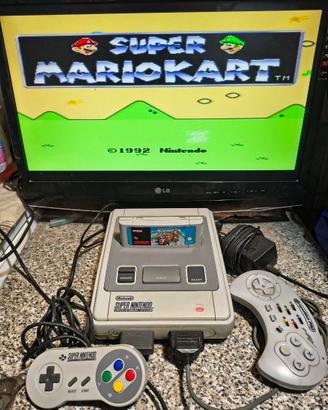 SUPERNINTENDO + 2 controllers + 7 cartucce giochi