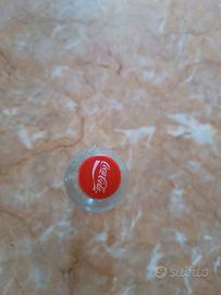 bottiglia coca-cola con figurina calciatoripanini 