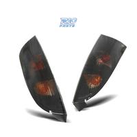 FANALI PER FORD FOCUS MK1 98-04 SFONDO NERO AFFUMI