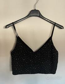 Top nero con paillettes